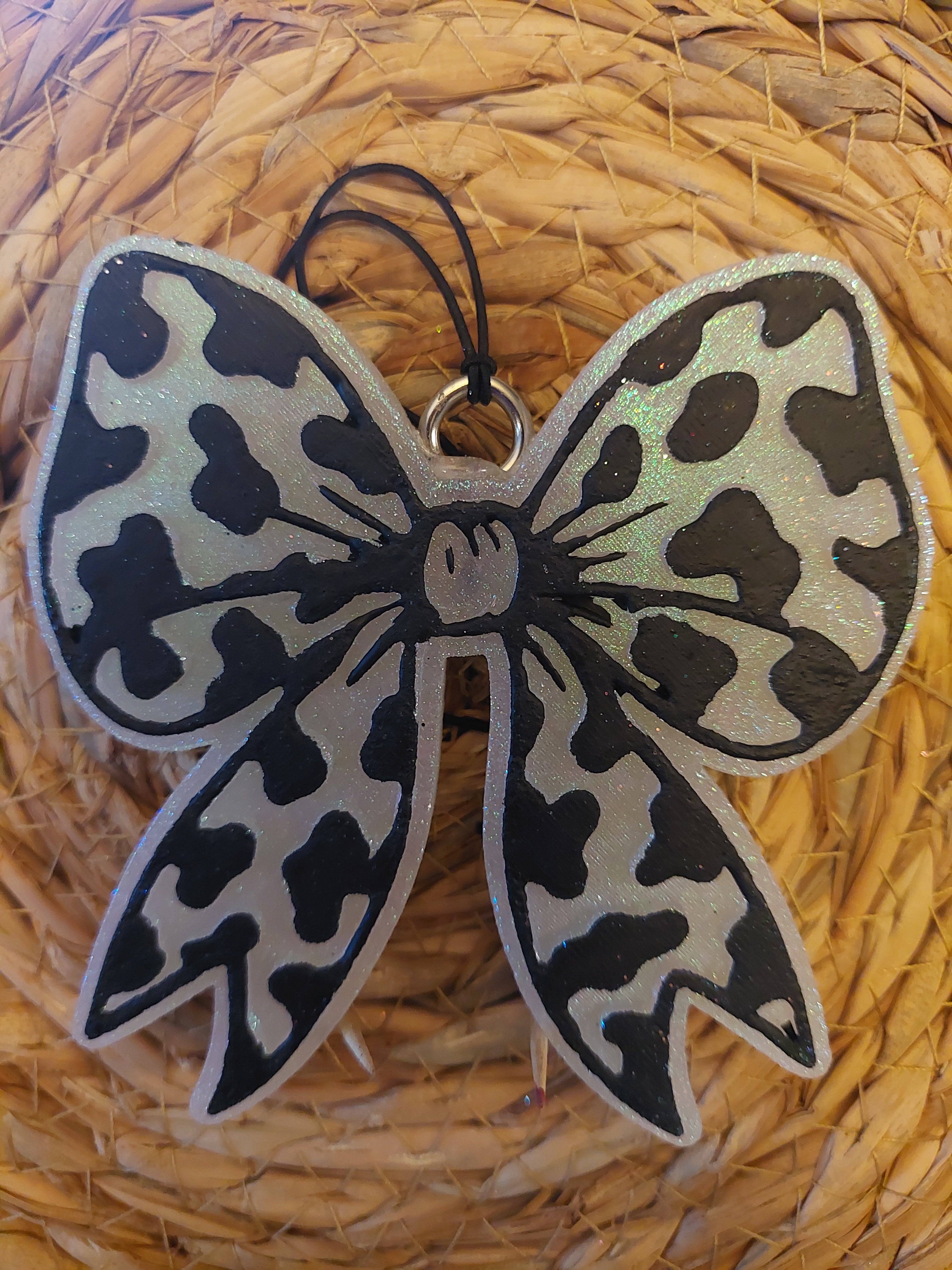 Iridescent bow (203)